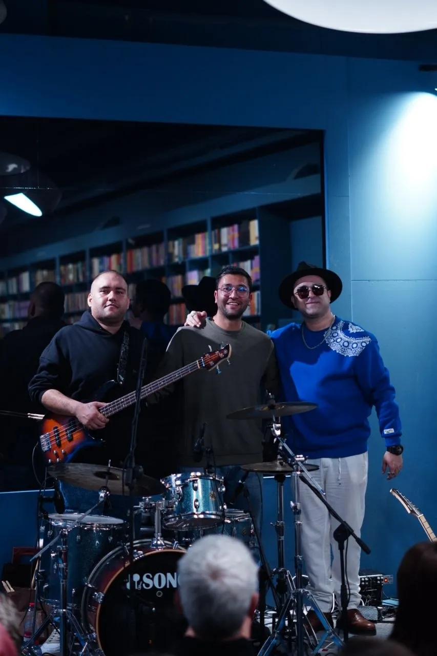 With bandmates after a bookstore-venue show