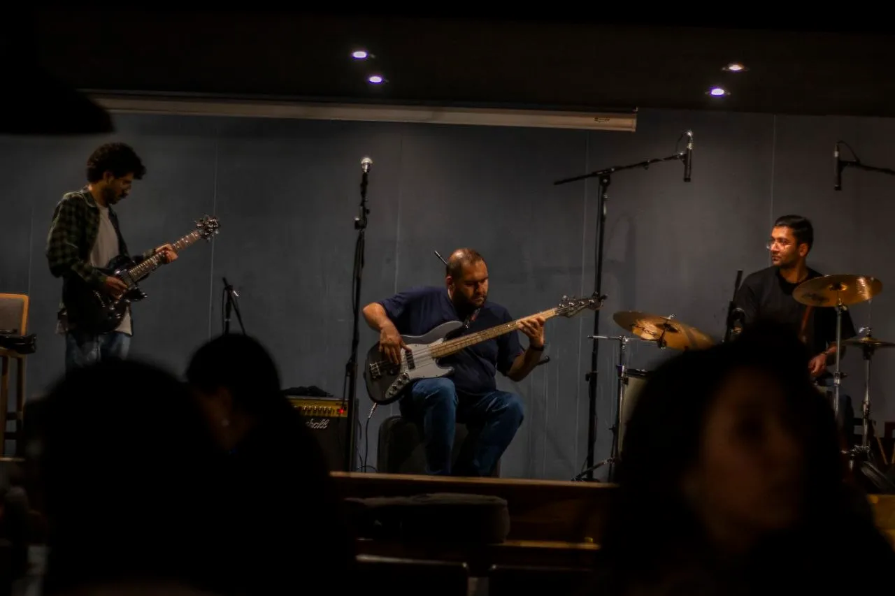 Dim club trio with a silver Jazz-style bass