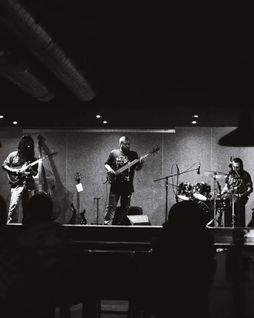 Solo-project trio, grainy black and white